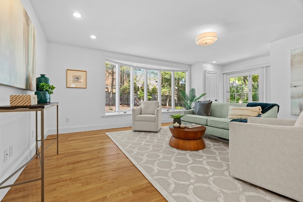 16 Vine Brook Road Lexington, MA 02421 - Photo 9 of 37 a living room with furniture and a large window