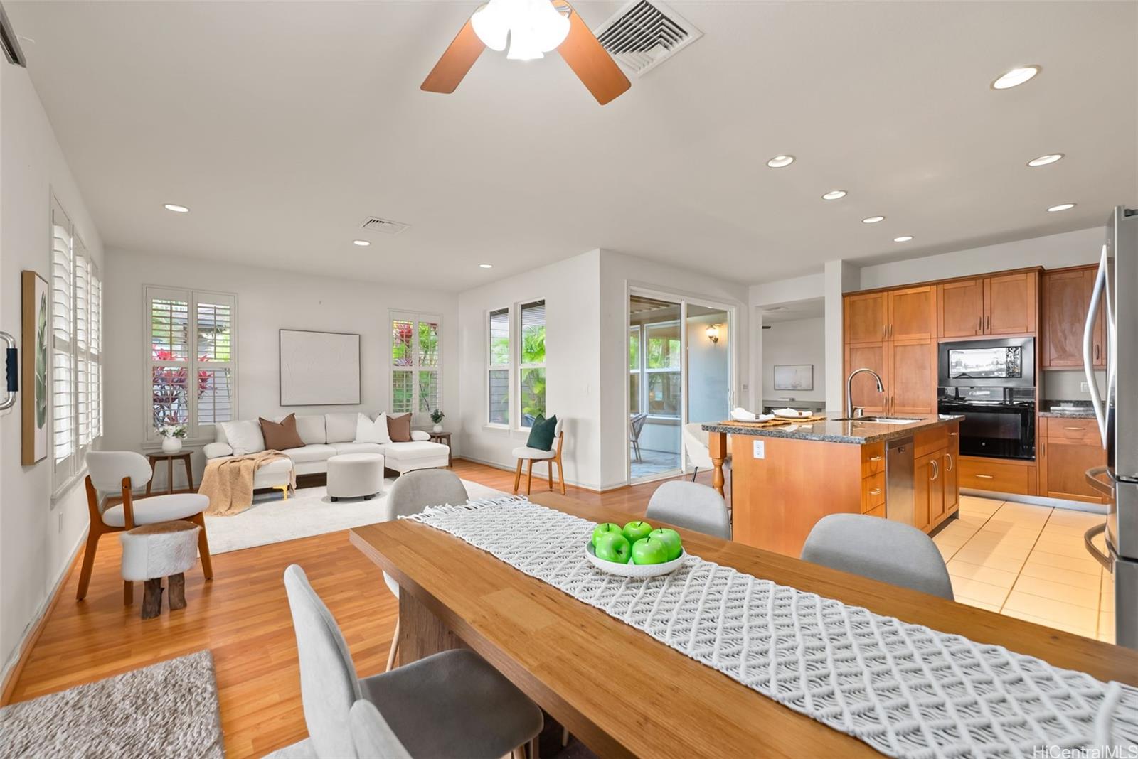 520 Lunalilo Home Road, Unit ER126 Honolulu, HI 96825 - Photo 11 of 25 a living room with furniture kitchen view and a large window