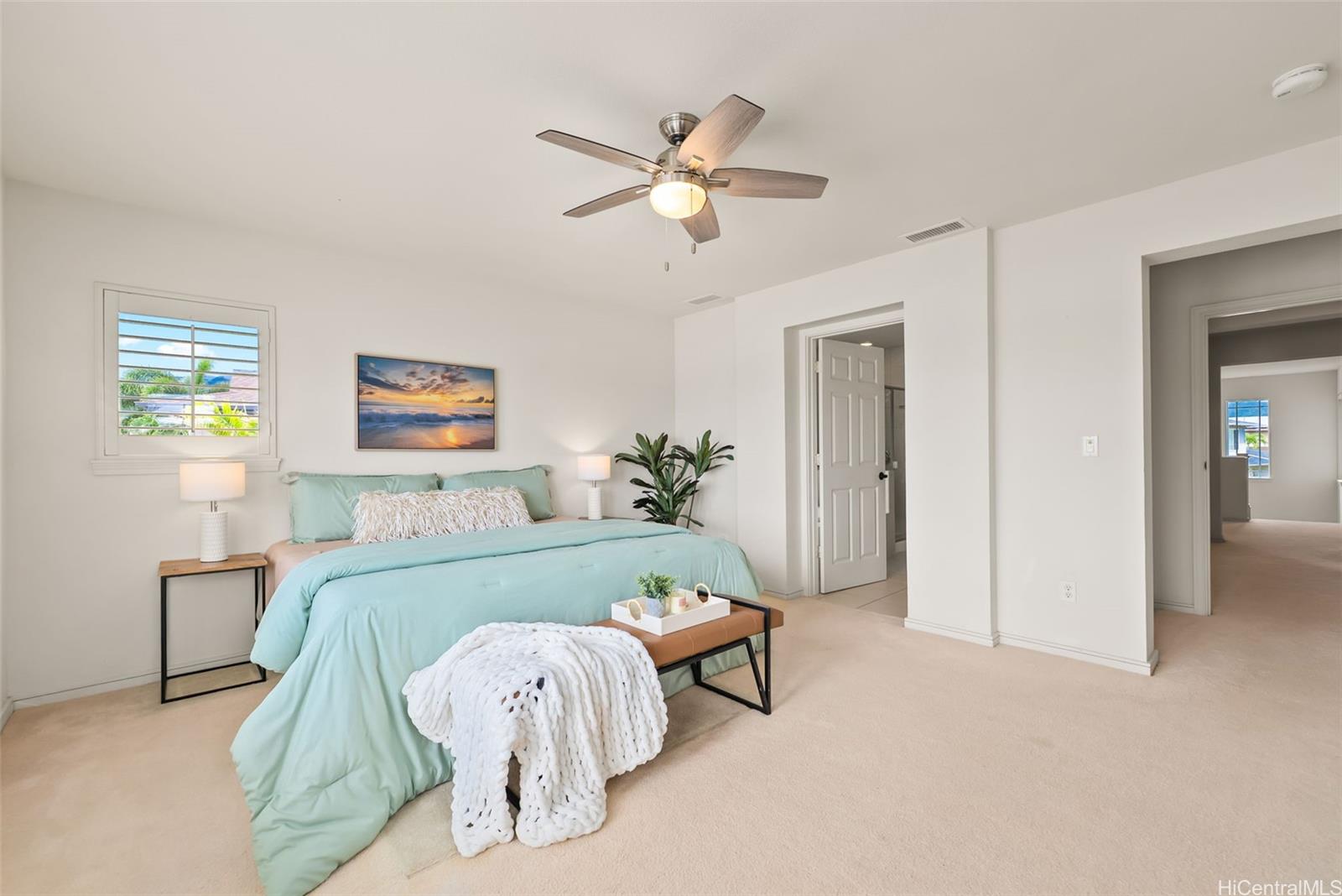 520 Lunalilo Home Road, Unit ER126 Honolulu, HI 96825 - Photo 17 of 25 a living room with furniture and a chandelier