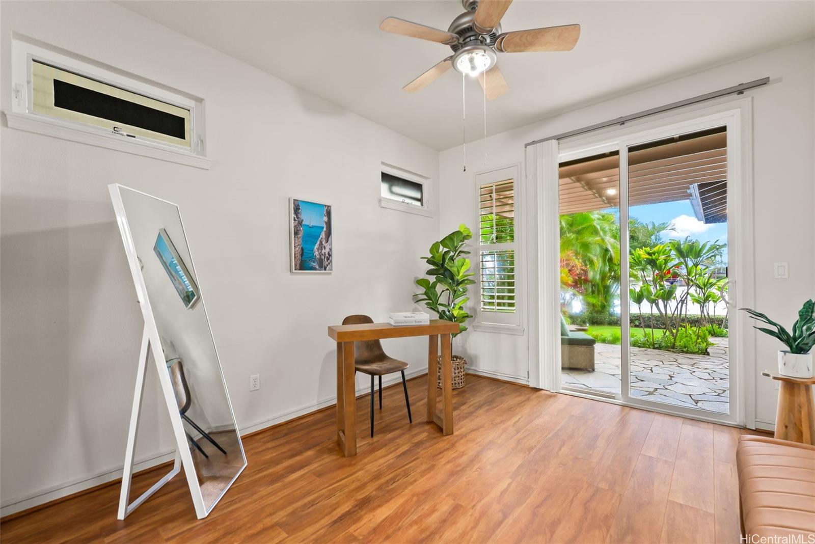 520 Lunalilo Home Road, Unit ER126 Honolulu, HI 96825 - Photo 21 of 25 a view of a livingroom with furniture and a potted plant