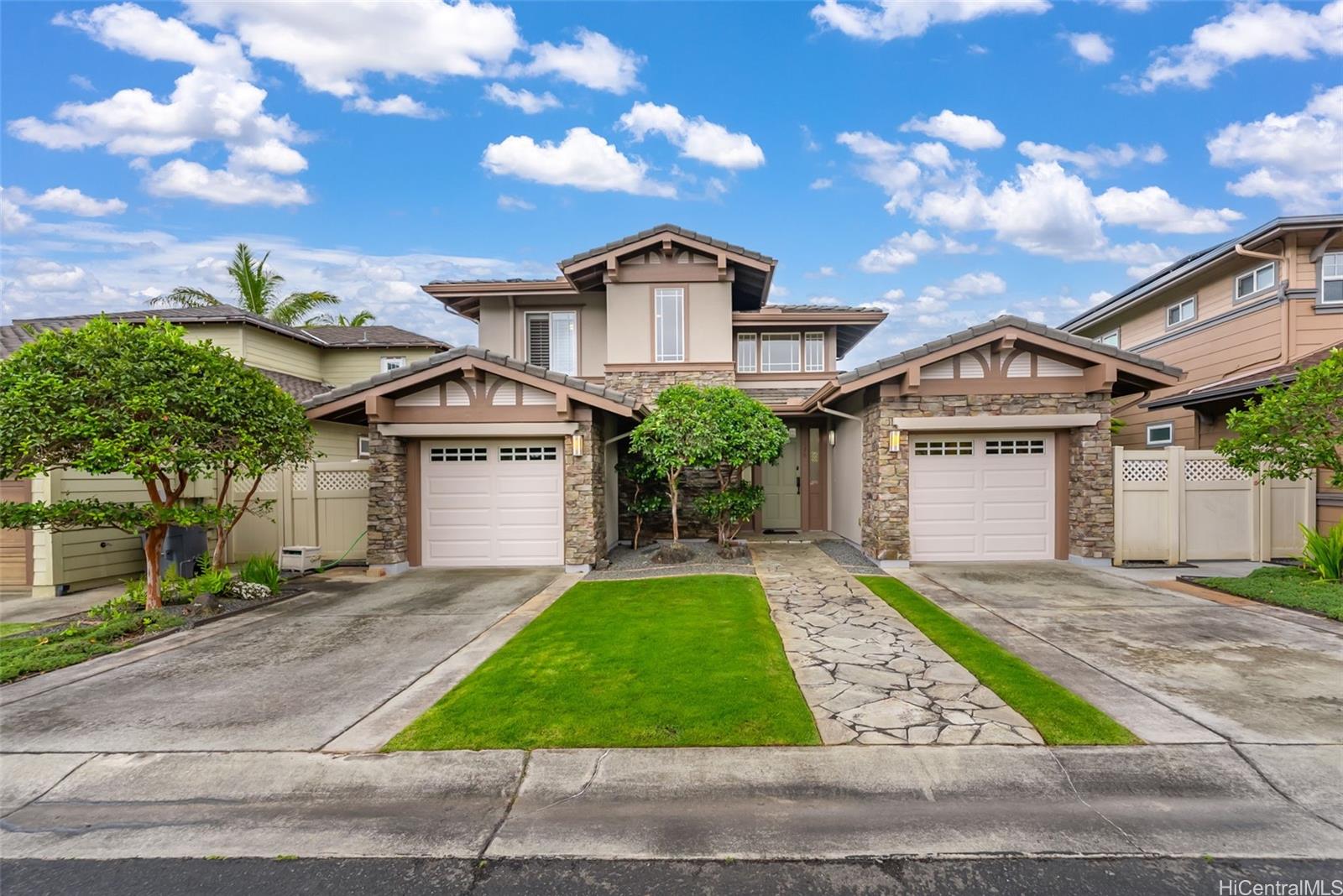 520 Lunalilo Home Road, Unit ER126 Honolulu, HI 96825 - Photo 23 of 25 a view of a big house with a big yard and large tree