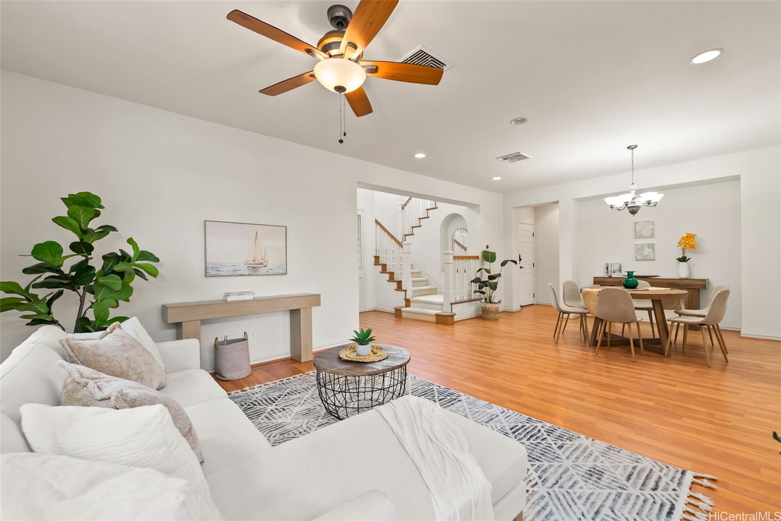 520 Lunalilo Home Road, Unit ER126 Honolulu, HI 96825 - Photo 8 of 25 a living room with furniture and a wooden floor