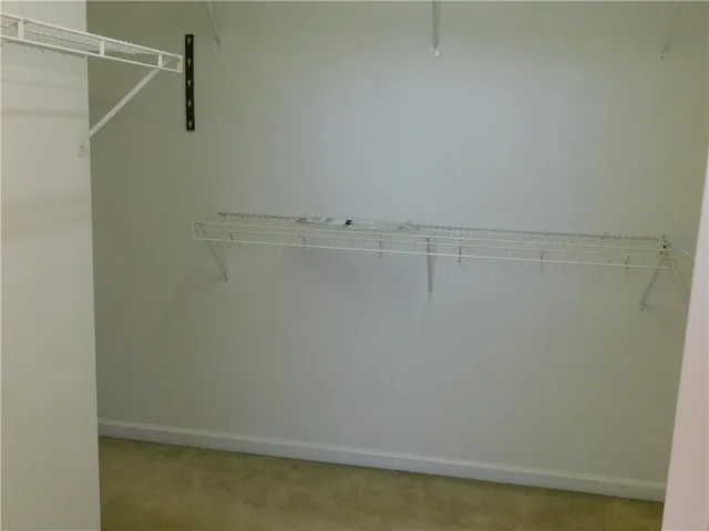 a view of small space with racks on the wall