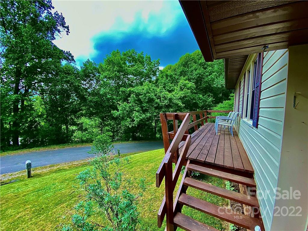 107 Old Mine Road Canton, NC 28716 - Photo 2 of 17 a view of a backyard with sitting area