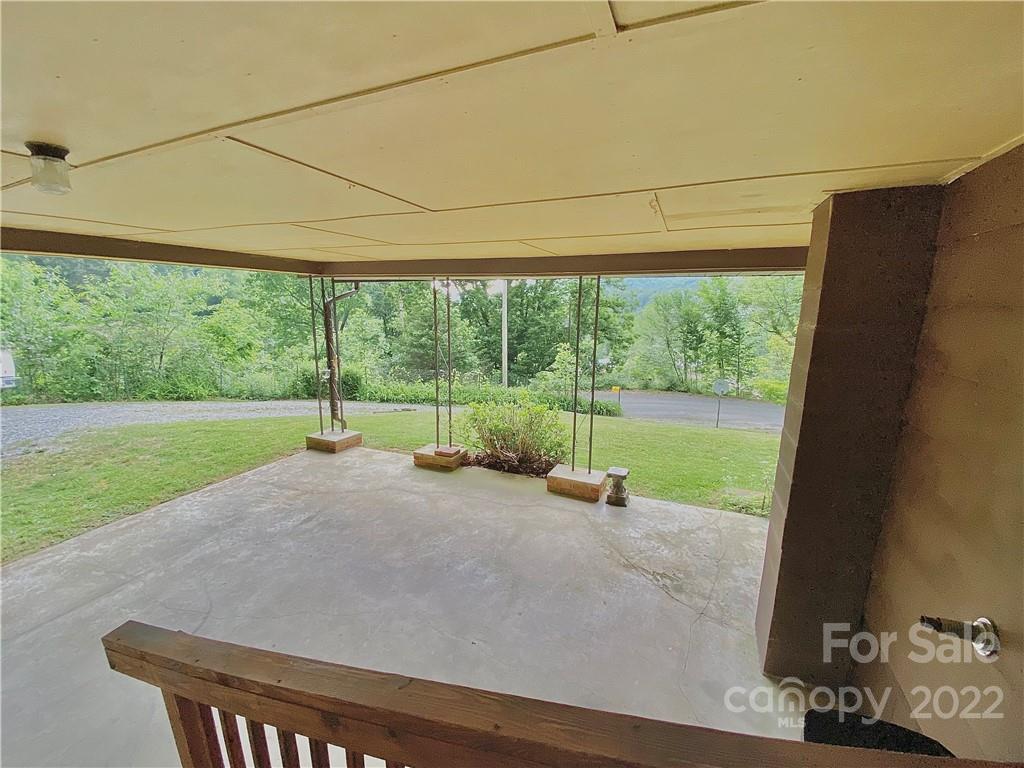 107 Old Mine Road Canton, NC 28716 - Photo 5 of 17 a view of a garden with an outdoor seating