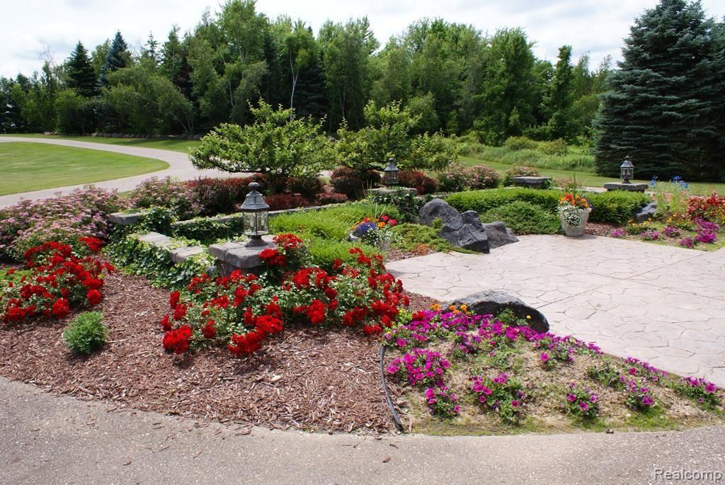 3850 West Oregon Road Lapeer, MI 48446 - Photo 10 of 94 Colorful landscaped beds at front entry.