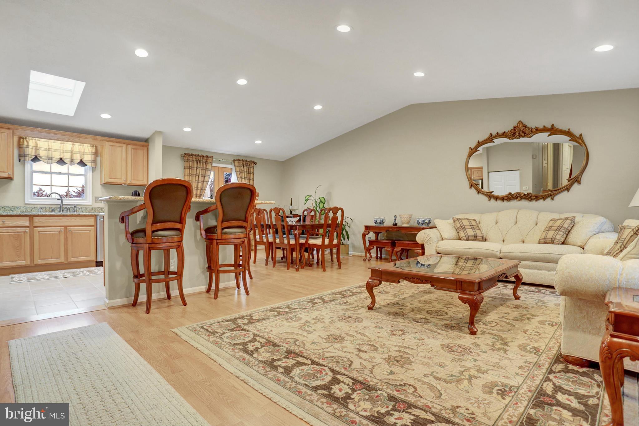 9503 Hallhurst Road Nottingham, MD 21236 - Photo 2 of 29 living/dining room with slider to deck
