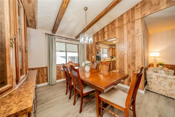 a dining room with furniture window wooden floor