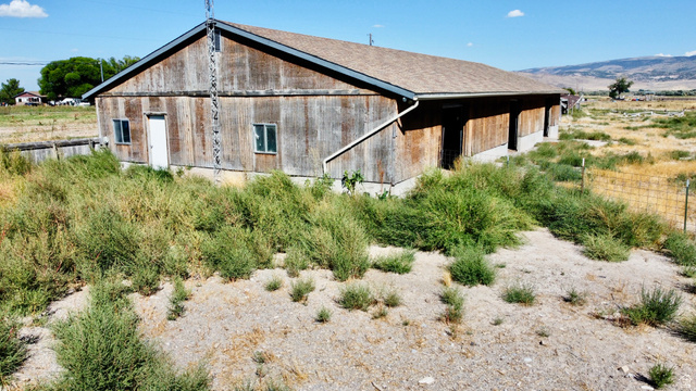 630 North Main Street Monroe, UT 84754 - Photo 40 of 63 Back of property featuring an outdoor structure