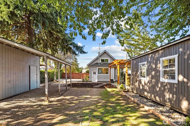 a house with trees in front of it
