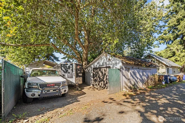 a view of a car park in front of house