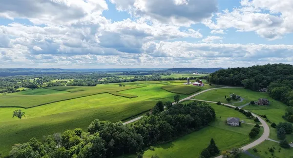 an aerial view of a golf course with the garden