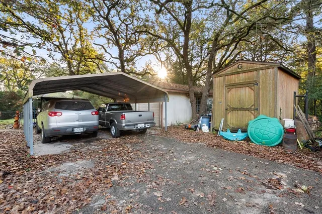 a view of a car parked in front of a house