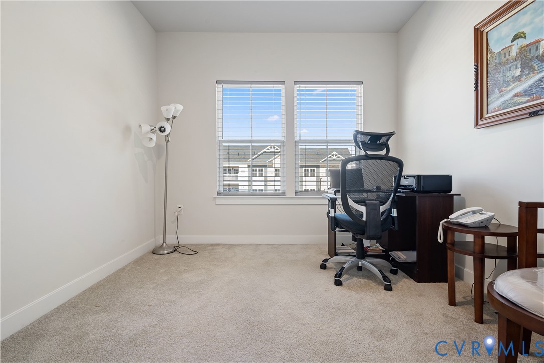 6601 Citory Way, Unit 304 Moseley, VA 23120 - Photo 23 of 33 a view of a workspace with furniture and a window