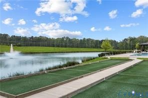 6601 Citory Way, Unit 304 Moseley, VA 23120 - Photo 29 of 33 a view of a lake from a yard