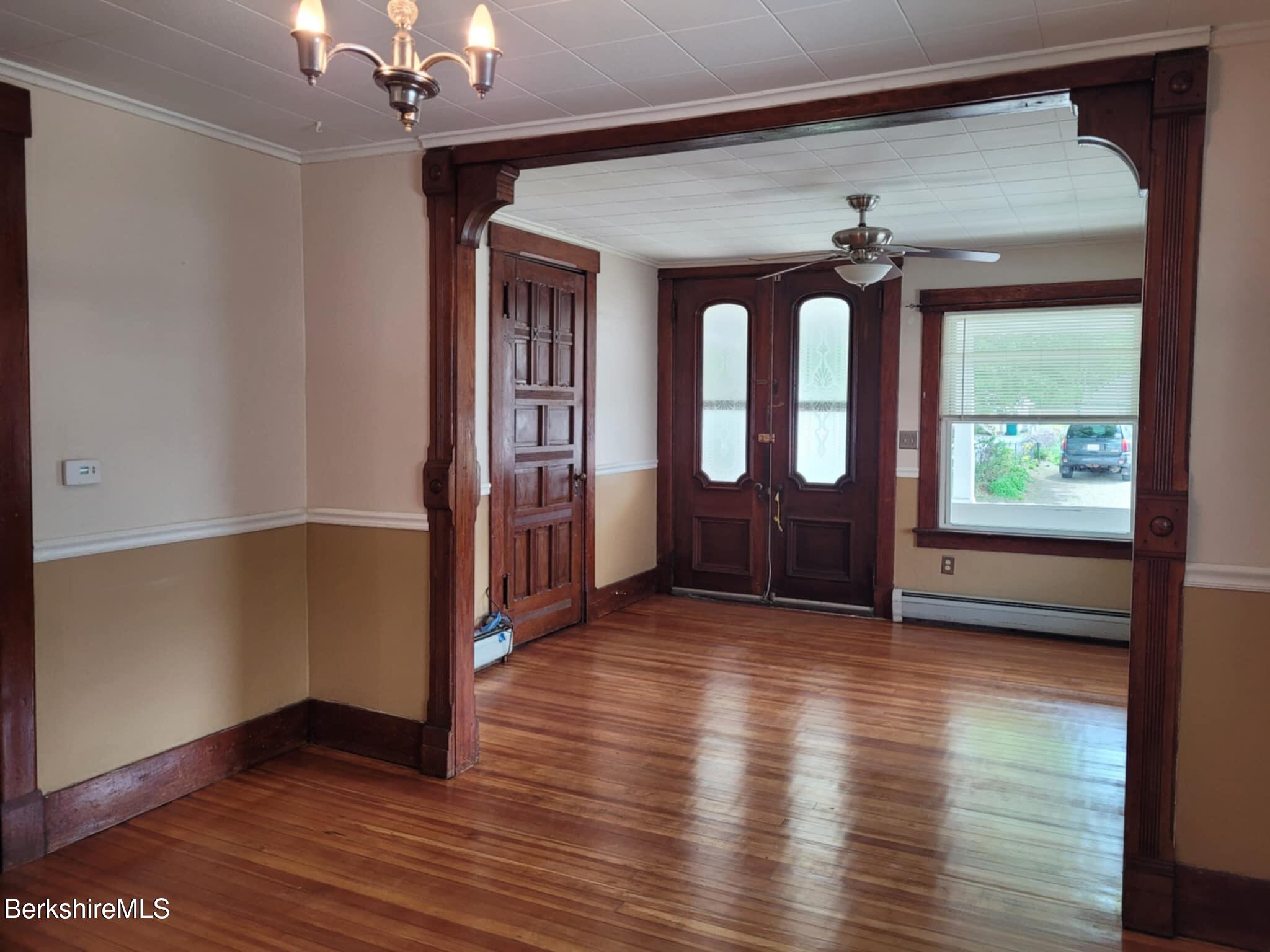 14 Pine Street Adams, MA 01220 - Photo 4 of 8 wooden floor in an empty room with a window
