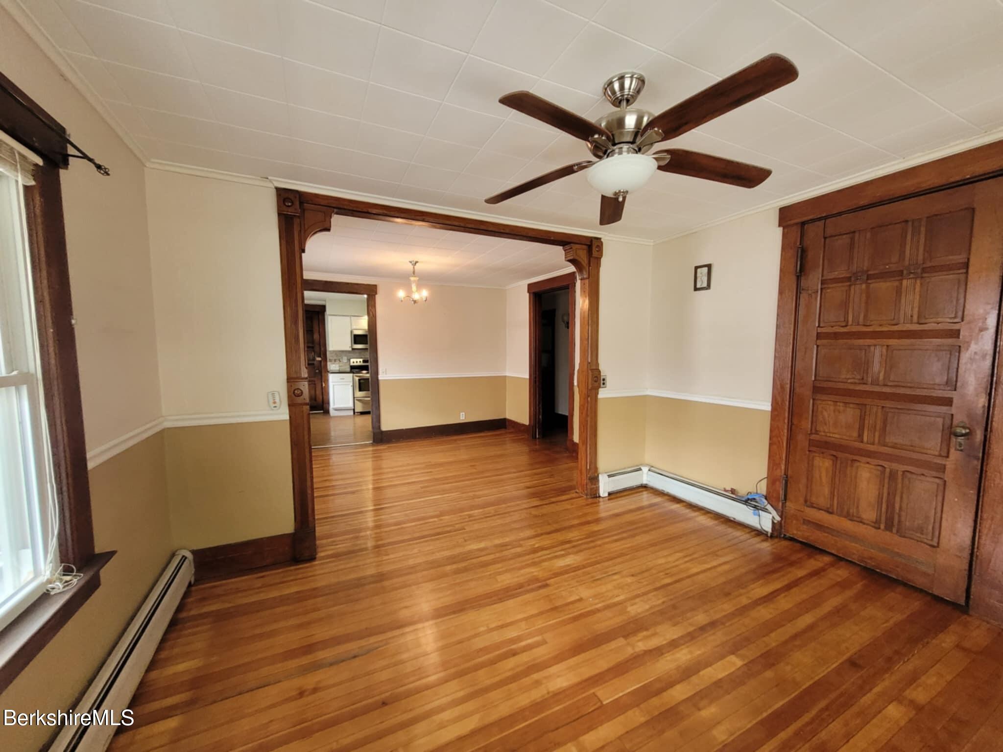 14 Pine Street Adams, MA 01220 - Photo 5 of 8 wooden floor in an empty room with a window