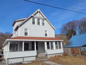 14 Pine Street Adams, MA 01220 - Photo 8 of 8 a front view of a house with a yard