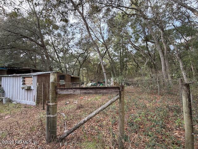 102 Lake Street Interlachen, FL 32148 - Photo 2 of 5 a view of a house with backyard