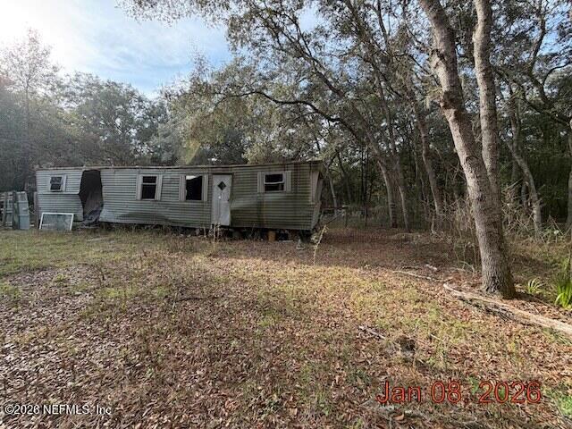102 Lake Street Interlachen, FL 32148 - Photo 4 of 5 front view of a house with a yard