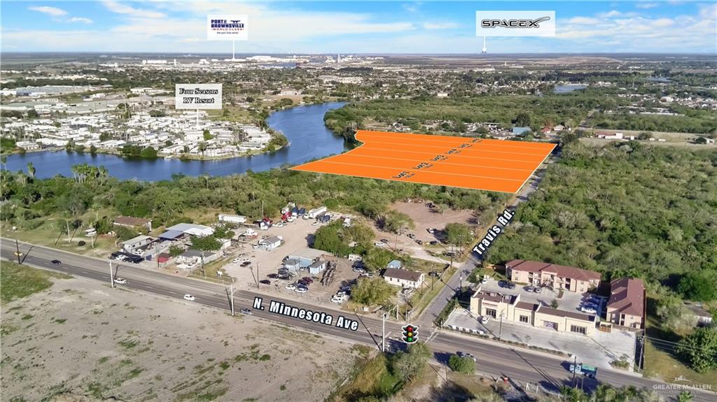 5887-6 Travis Road Brownsville, TX 78521 - Photo 1 of 8 an aerial view of a city