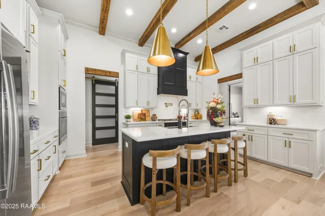 $569,000 | 300 Alexander Palm Avenue, Youngsville, LA 70592