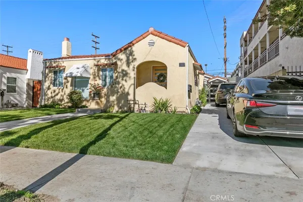 a view of parking and yard