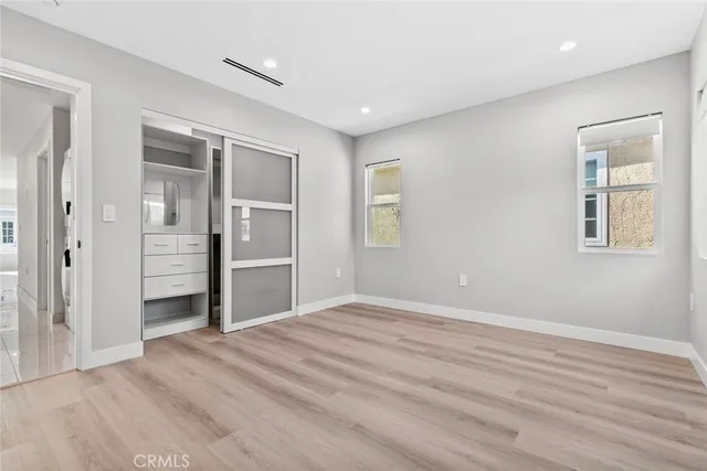 a view of an empty walk in closet