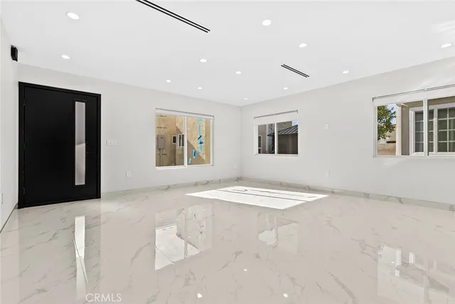 a view of a kitchen with cabinets