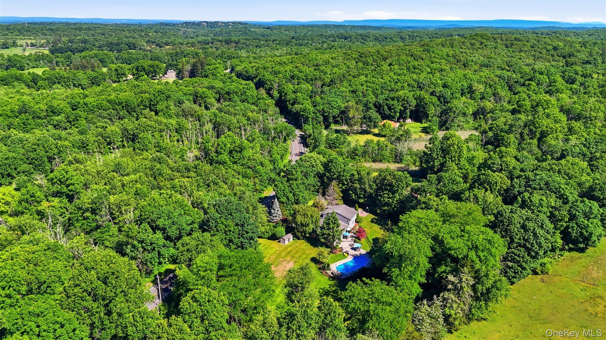 985 Craigville Road Chester, NY 10918 - Photo 35 of 36 Aerial overview of a private residential property amidst extensive tree coverage