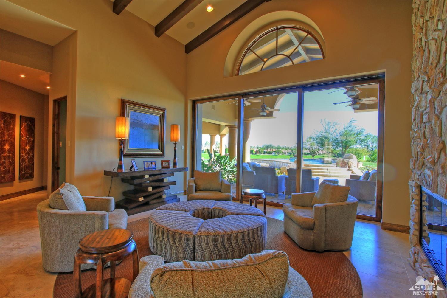 57300 Peninsula Lane La Quinta, CA 92253 - Photo 14 of 97 a living room with furniture and a large window