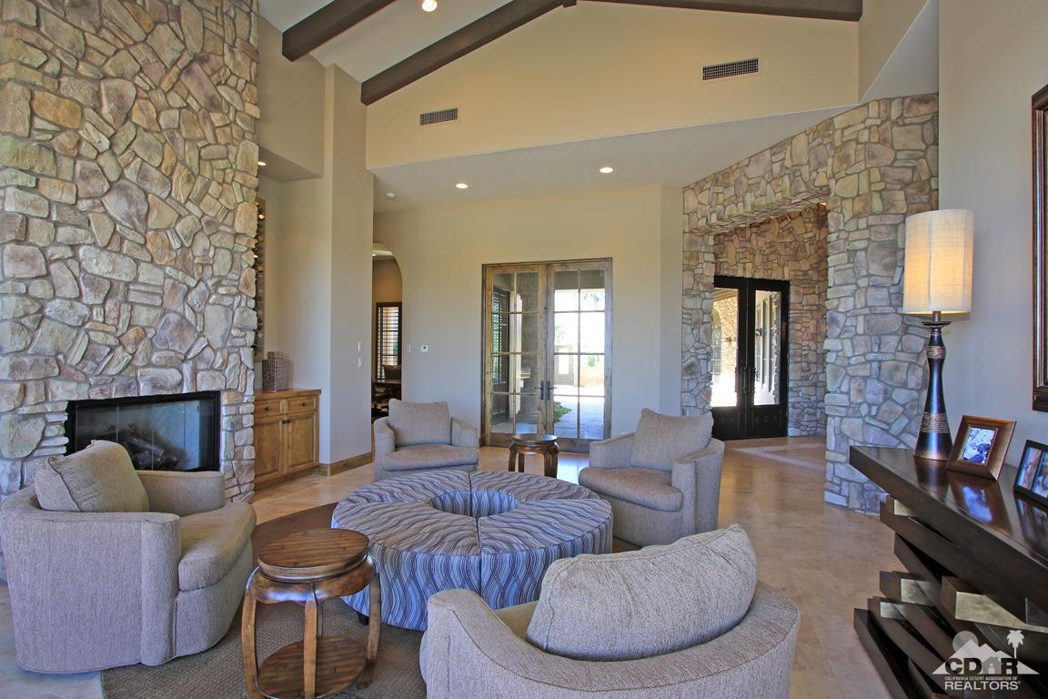 57300 Peninsula Lane La Quinta, CA 92253 - Photo 18 of 97 a living room with furniture and a fireplace