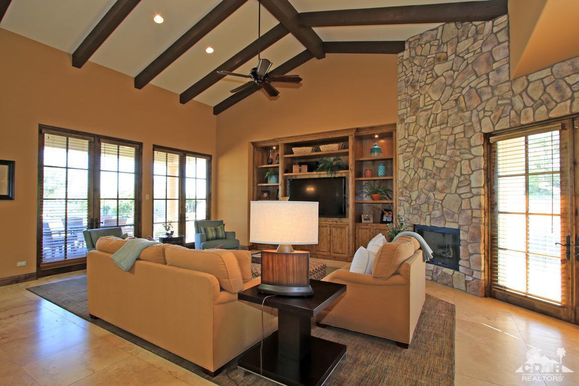 57300 Peninsula Lane La Quinta, CA 92253 - Photo 19 of 97 a living room with furniture and large windows