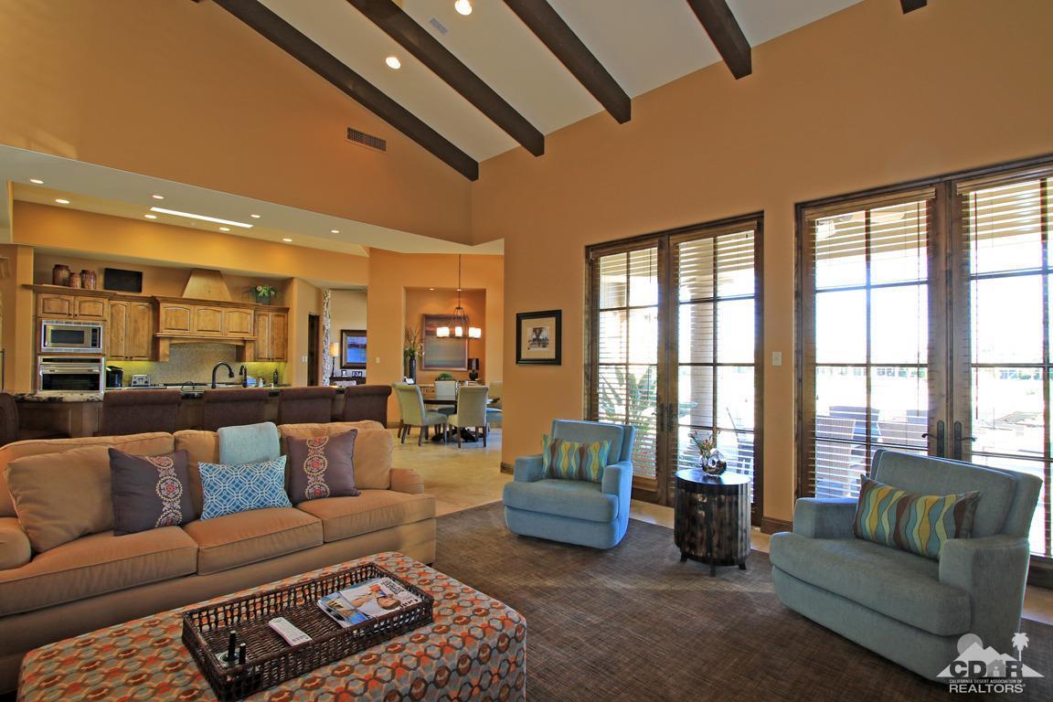 57300 Peninsula Lane La Quinta, CA 92253 - Photo 22 of 97 a living room with furniture and a large window