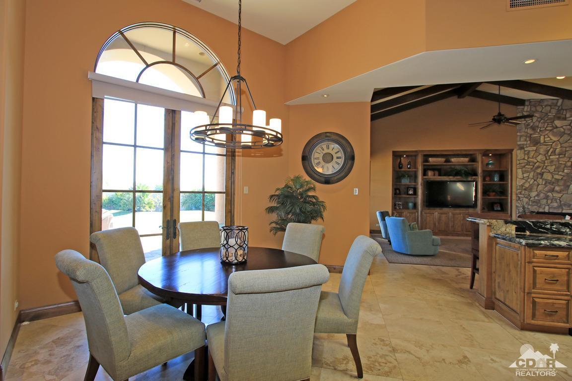 57300 Peninsula Lane La Quinta, CA 92253 - Photo 34 of 97 a view of a dining room with furniture and a large window