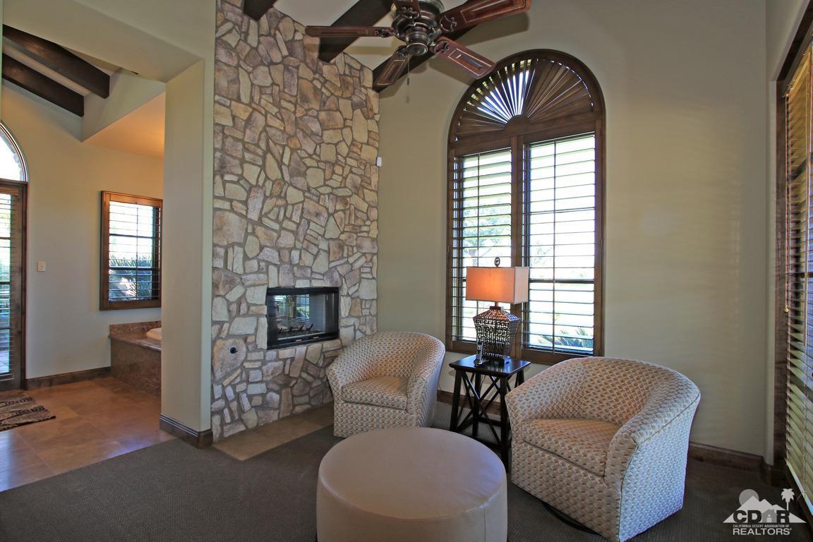 57300 Peninsula Lane La Quinta, CA 92253 - Photo 39 of 97 a living room with furniture and a fireplace