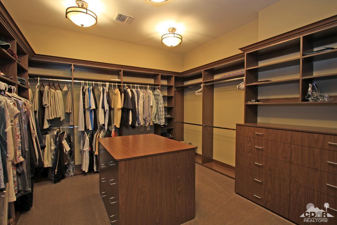 57300 Peninsula Lane La Quinta, CA 92253 - Photo 43 of 97 a view of walk in closet with clothes and shoes