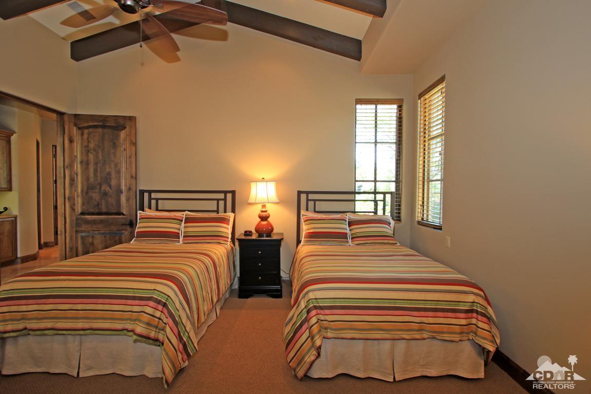 57300 Peninsula Lane La Quinta, CA 92253 - Photo 50 of 97 a bedroom with double bed and a window