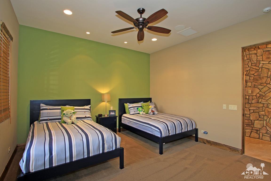 57300 Peninsula Lane La Quinta, CA 92253 - Photo 54 of 97 a bedroom with two beds and painting on the wall