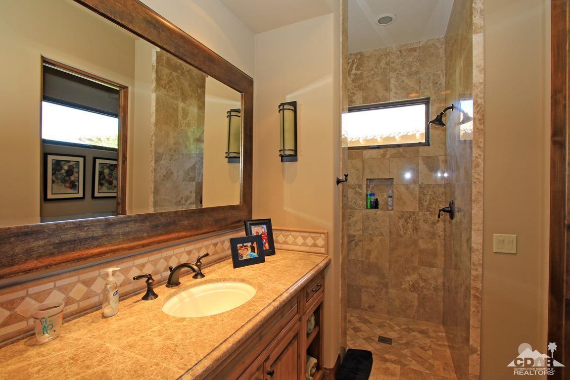 57300 Peninsula Lane La Quinta, CA 92253 - Photo 55 of 97 a bathroom with a granite countertop sink mirror and double