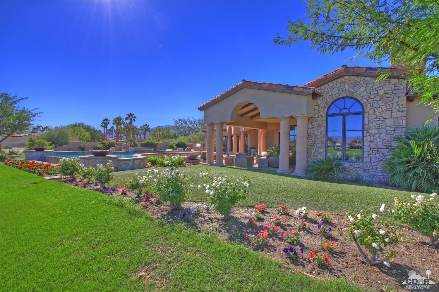 57300 Peninsula Lane La Quinta, CA 92253 - Photo 78 of 97 a front view of a house with garden