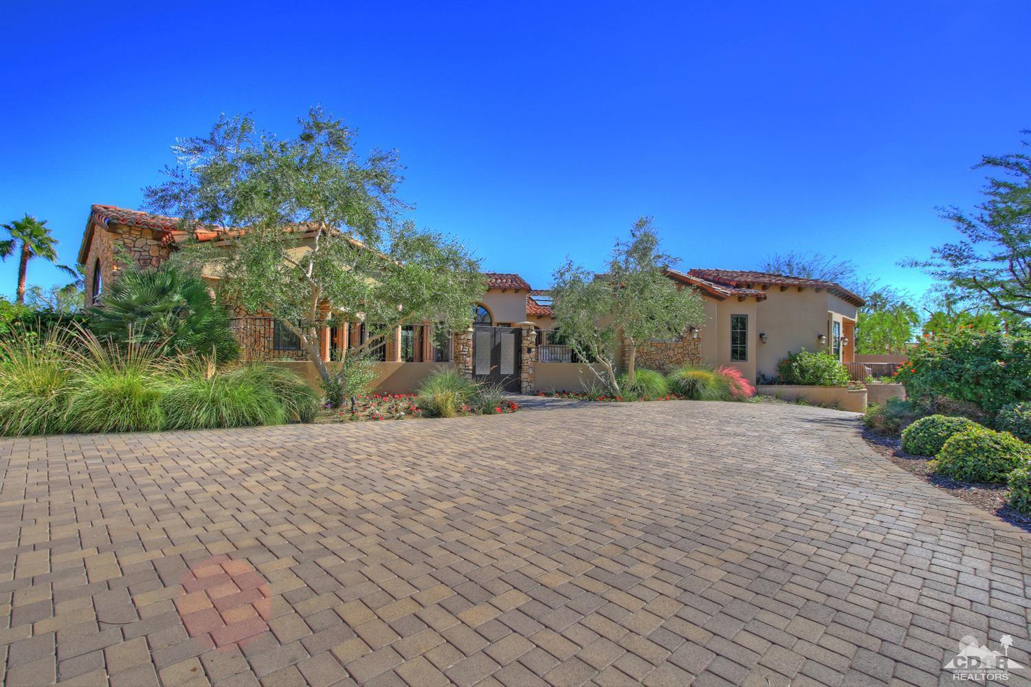 57300 Peninsula Lane La Quinta, CA 92253 - Photo 91 of 97 a front view of a house with a yard and garage