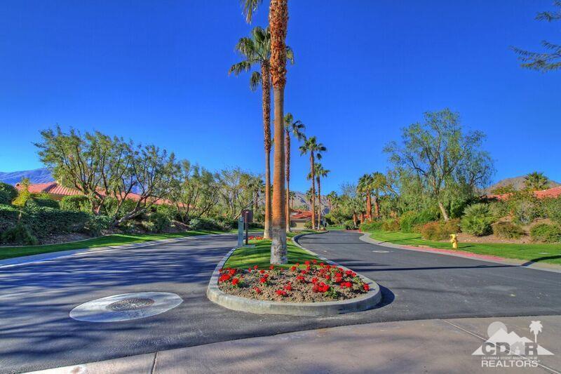 57300 Peninsula Lane La Quinta, CA 92253 - Photo 96 of 97 a view of a wooden floor and a fire pit