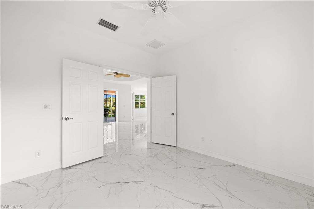 3972 Ruxton Road Naples, FL 34116 - Photo 26 of 41 a view of an empty room