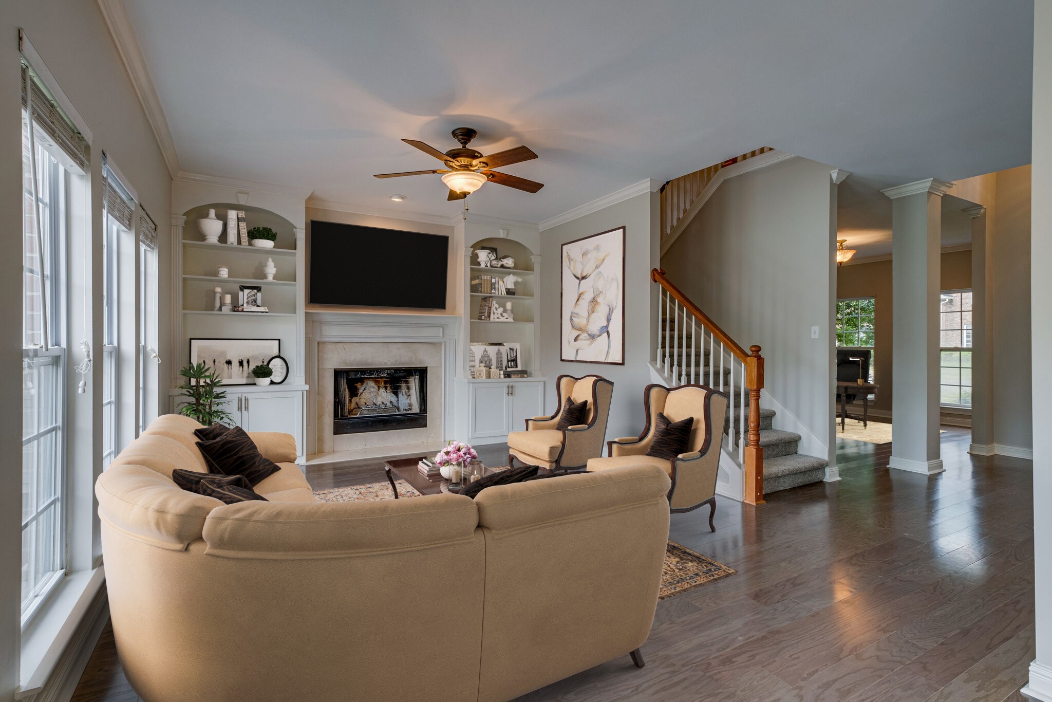 108 Berwick Place Franklin, TN 37064 - Photo 13 of 28 a living room with furniture a flat screen tv and a fireplace
