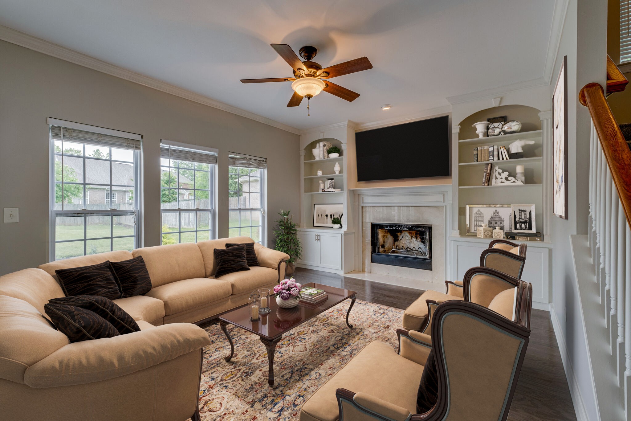 108 Berwick Place Franklin, TN 37064 - Photo 14 of 28 a living room with furniture a flat screen tv and a fireplace