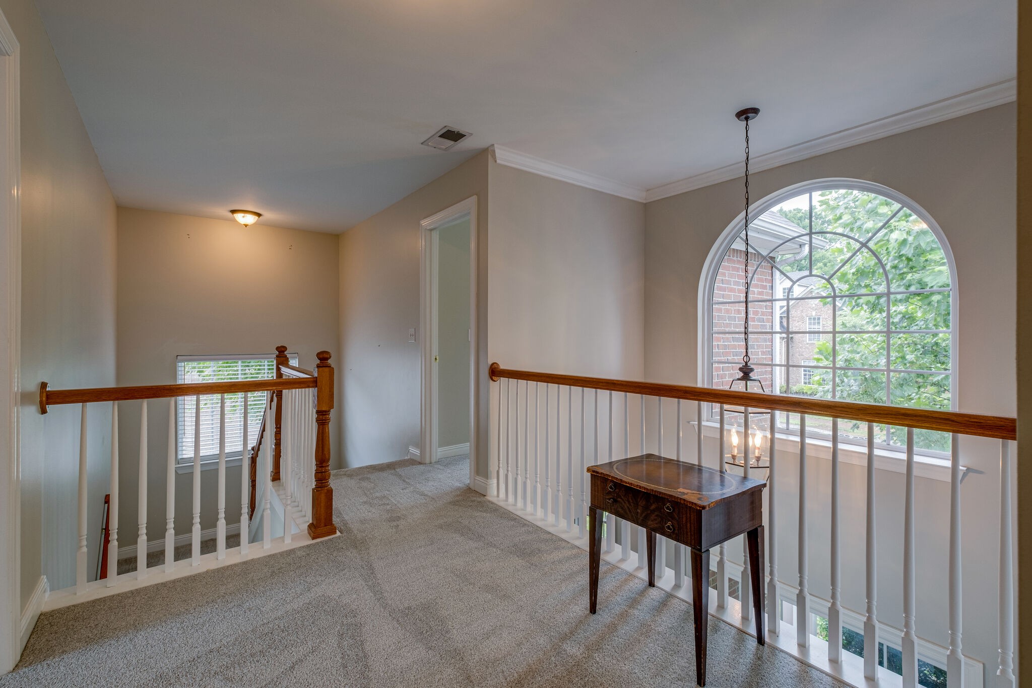 108 Berwick Place Franklin, TN 37064 - Photo 16 of 28 a view of an entryway door with a chandelier