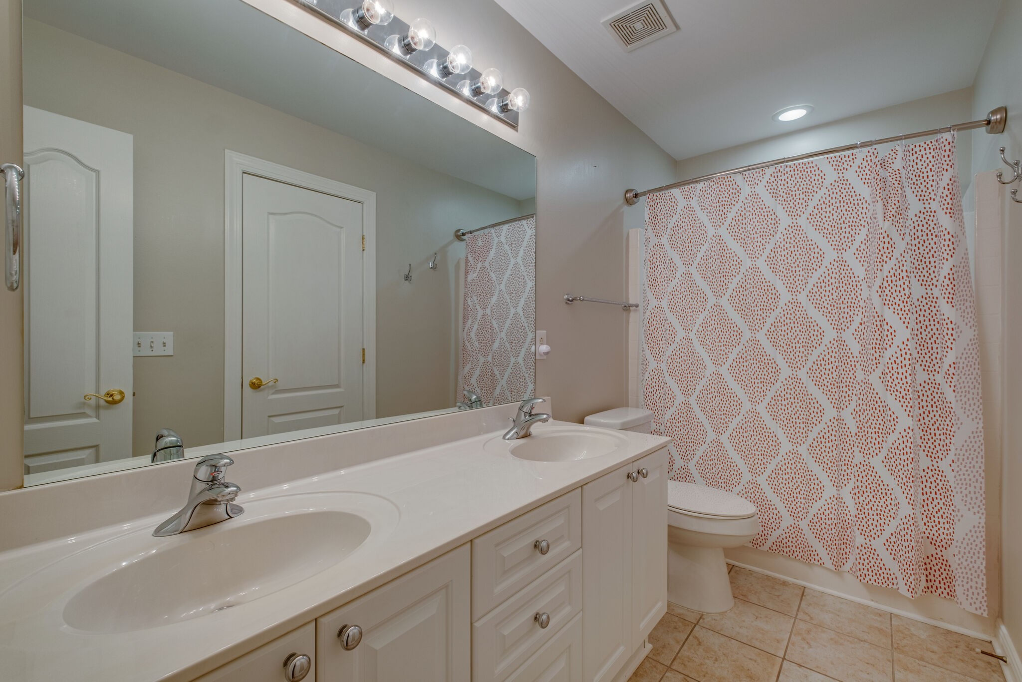 108 Berwick Place Franklin, TN 37064 - Photo 24 of 28 a bathroom with a double vanity sink and a mirror