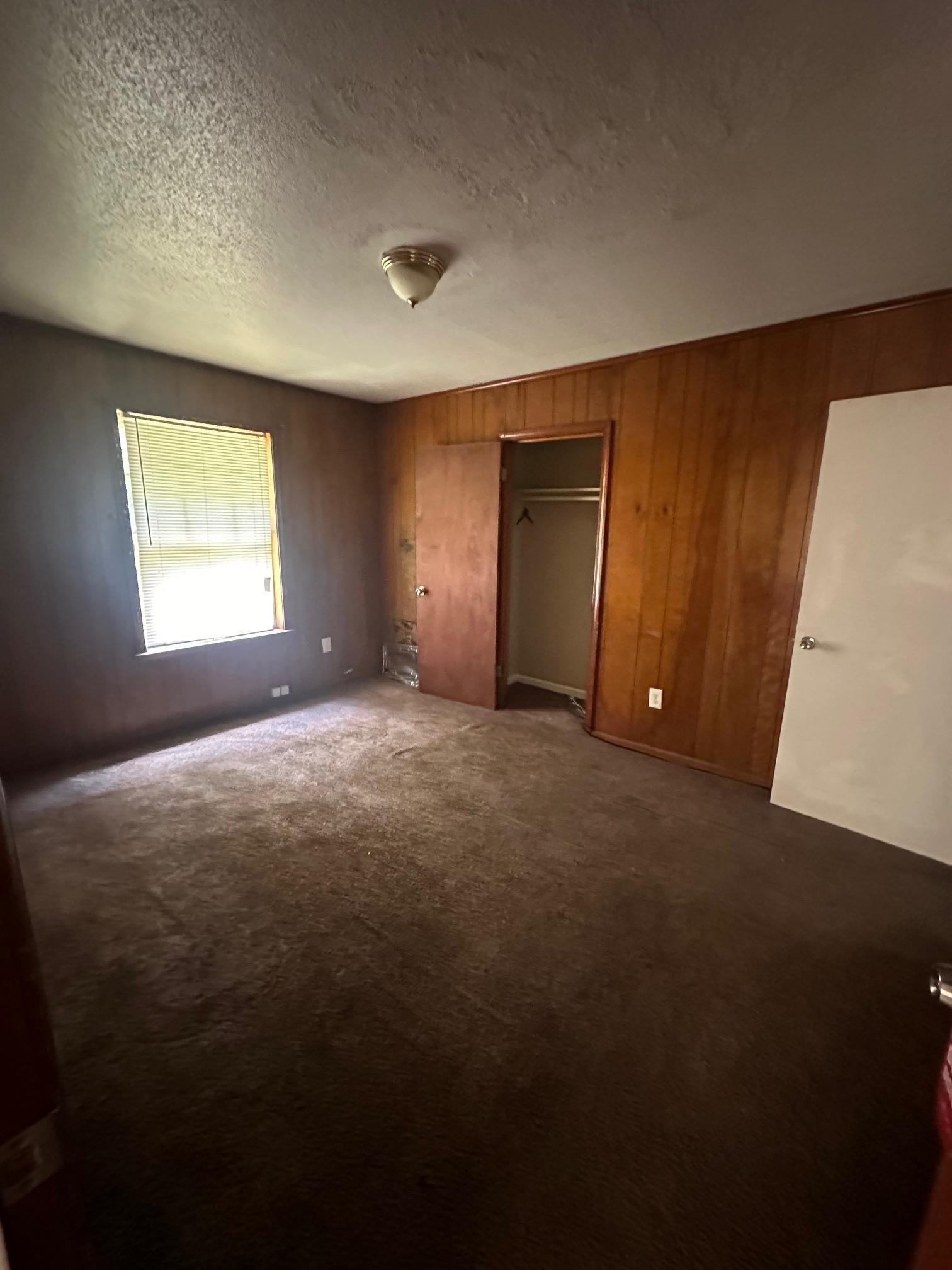 4488 Old Quarry Road Memphis, TN 38118 - Photo 5 of 5 a view of an empty room with a window
