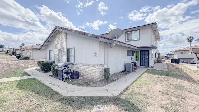 a front view of a house with a patio
